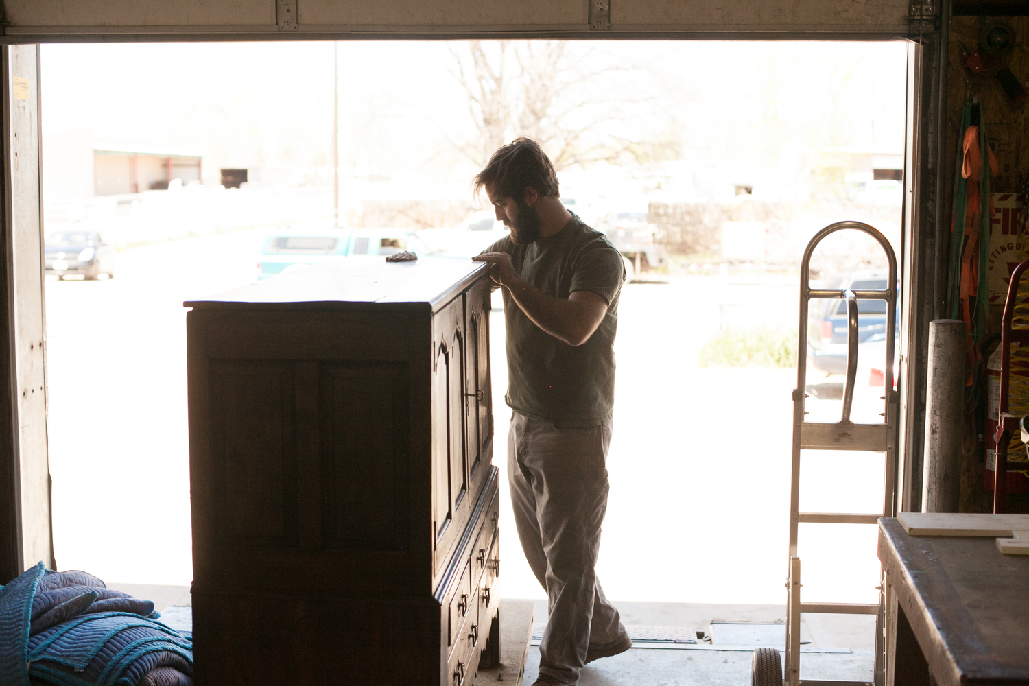 Cabinet prepared inside G. Michael's Fort Collins restoration studio