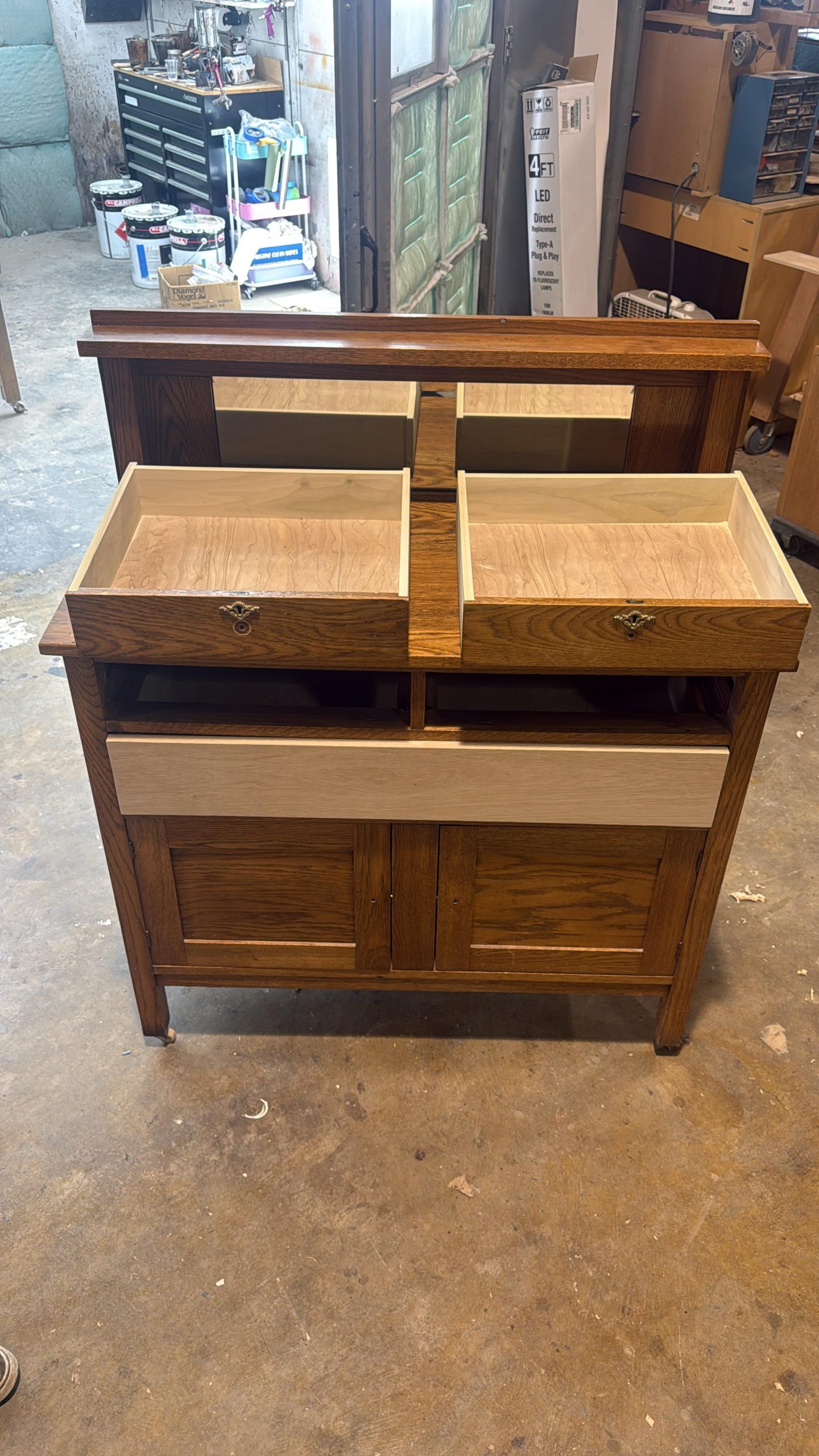 Before restoration (missing components and incomplete drawer system)